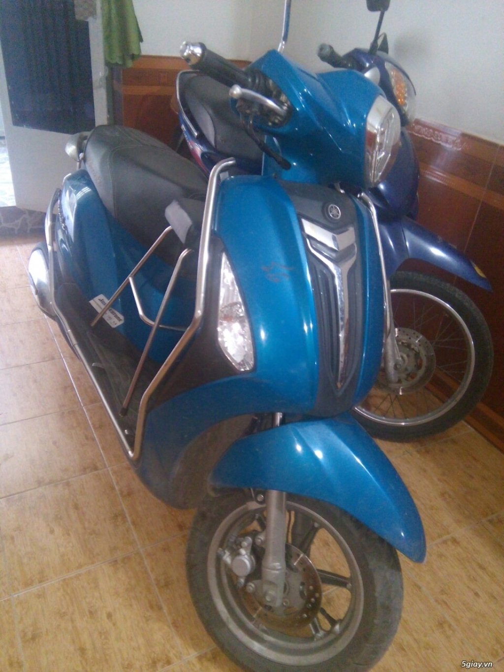 Cần bán xe Grande 12/2015 chính chủ Quận Bình Thạnh giá 33tr 18.000 km - 2