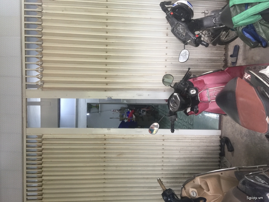 Thanh lý bộ cửa sắt xếp lớn hai cánh mới mua
