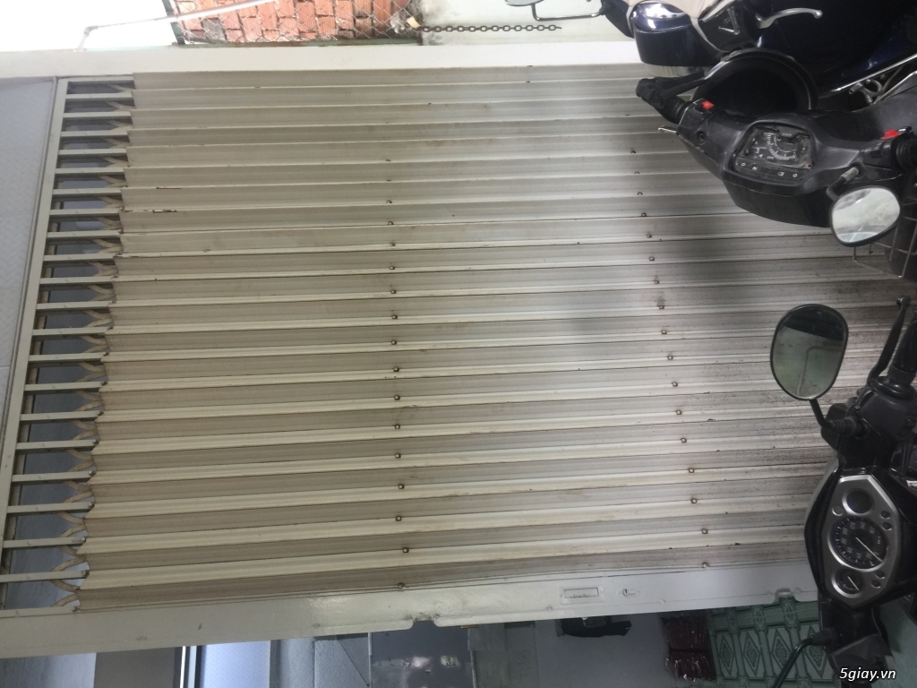Thanh lý bộ cửa sắt xếp lớn hai cánh mới mua - 1