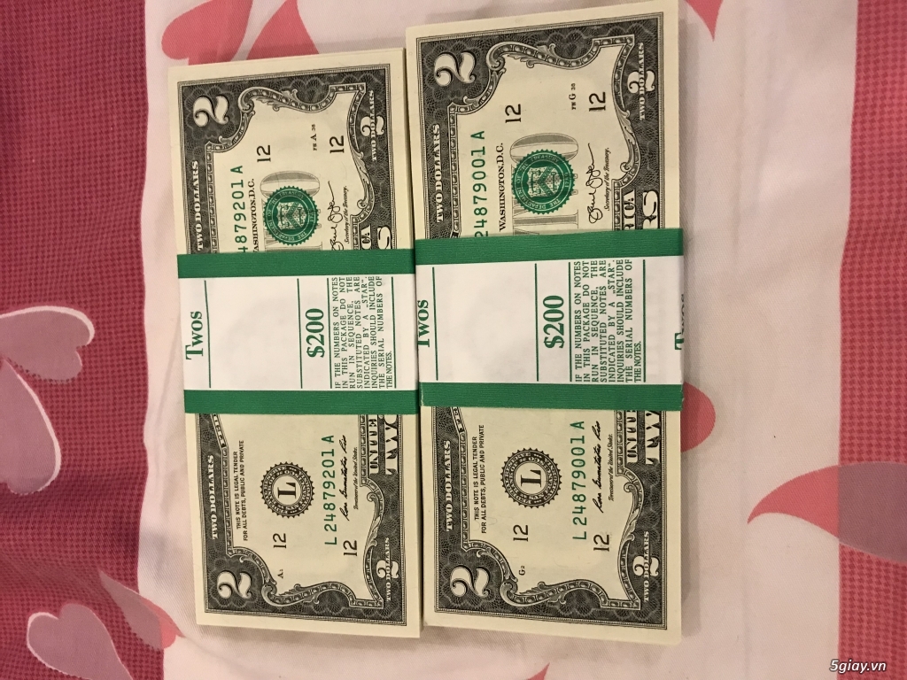 Tiền $2 lì xì Tết lấy hên. Đỗi tiền $2 đô Mỹ.