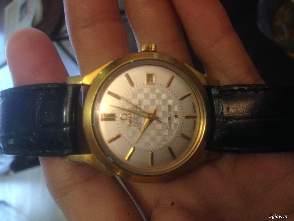Đồng hồ omega bát quái dây da vàng
