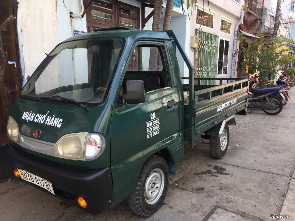 Xe 4 bánh thí điểm thay thế xe ba gác - 50TĐ chạy được giờ cấm . - 9