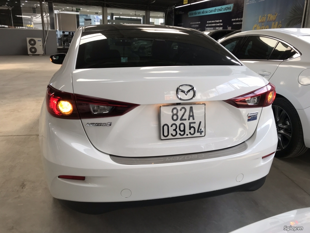 Bán Mazda 3 sedan 1.5AT màu trắng số tự động sản xuất 2015 xe đẹp - 1