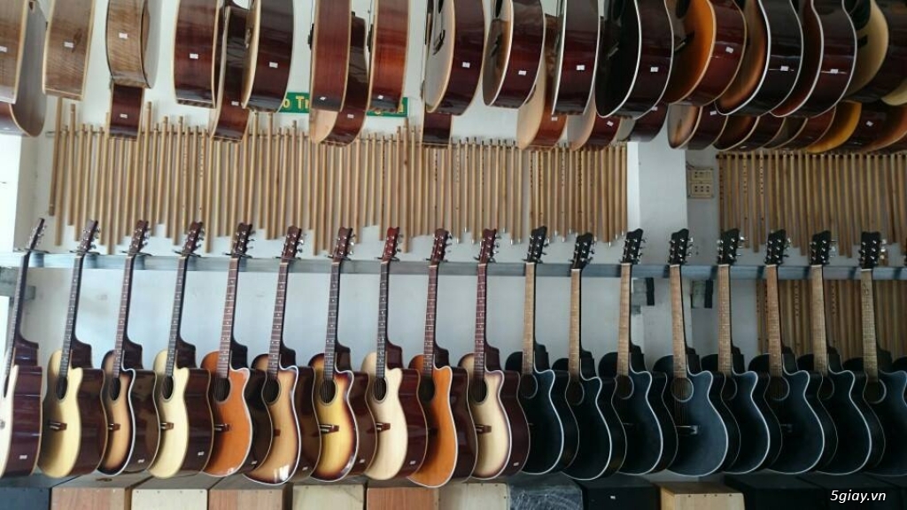 Bán guitar gỗ hồng đào giá siêu rẻ tại bình dương - 14