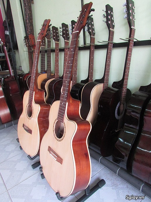 Bán guitar gỗ hồng đào giá siêu rẻ tại bình dương - 8
