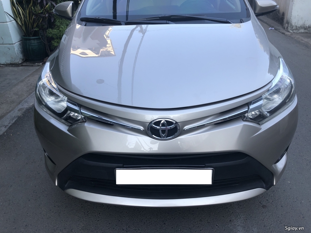 Cần bán Toyota Vios E 2017 số sàn màu nâu vàng, biển số tp - 5